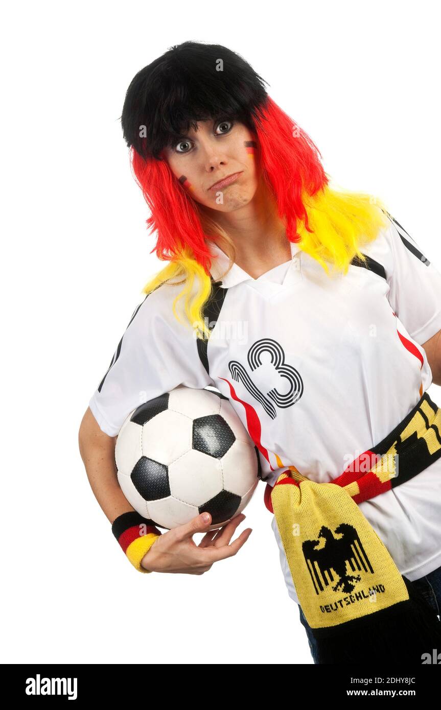 Fußballfan für Deutschland, Ball, Schal, Haare in Nationalfarben Stock Photo