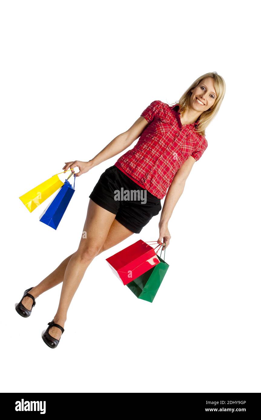 Frau war Einkaufen, freut sich, Shopping Stock Photo