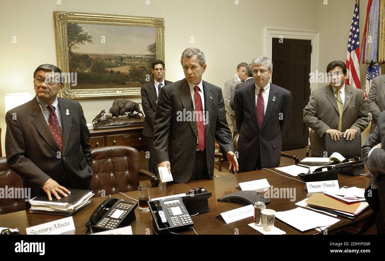 United States President George W. Bush meets with staff to discuss the airline industry in the Roosevelt Room of the White House in Washington, DC, USA, Monday, September 17, 2001. From left, US Secretary of Transportation Norman Mineta, Deputy Chief of Staff Josh Bolten, and White House Counsel Alberto Gonzales. Photo by Eric A. Draper/CNP/ABACAPRESS.COM Stock Photo