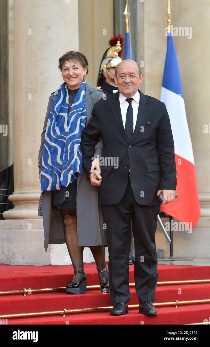 French Minister of Defence Jean-Yves Le Drian and his wife Maria Vadillo  arriving at the Elysee Palace for a state dinner hosted by French President  Francois Hollande in the honor of the