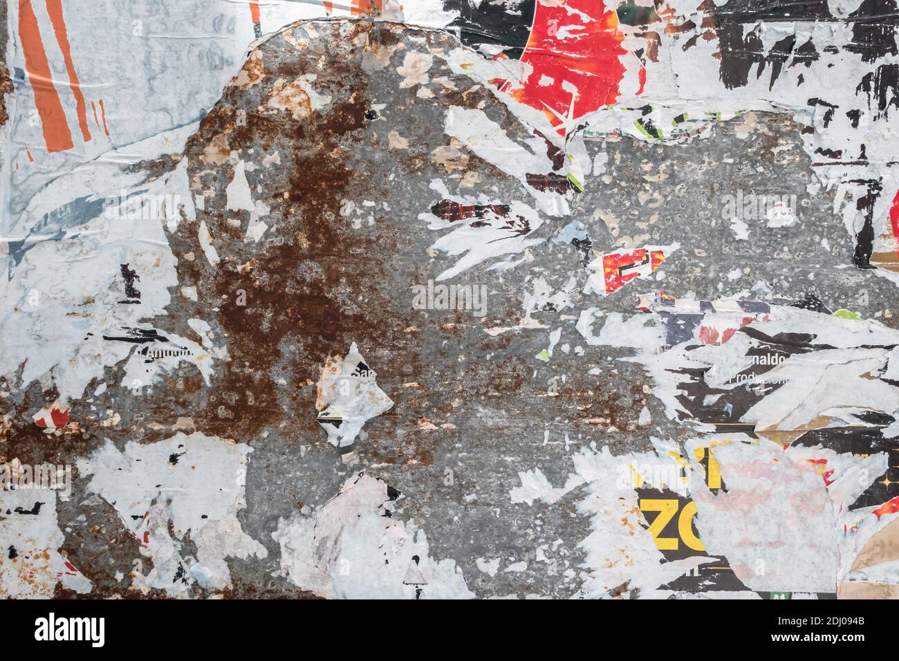 Grunge Background with Old Torn Posters. Multicolor texture. Stock Photo