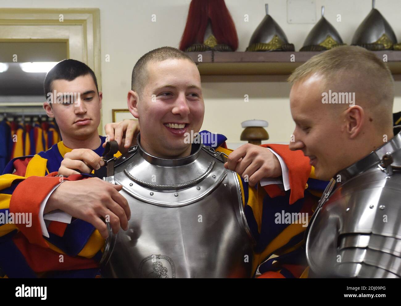 The Vatican's Swiss Guards swore in 23 new recruits on May 6, 2016 at the Vatican. The new recruits joined their ranks in an elaborate swearing-in ceremony . The ceremony is held each May 6 to commemorate the 147 Swiss Guards who died protecting Pope Clement VII during the 1527 Sack of Rome. Then each new recruit grasped the corps' flag and, raising three fingers in a symbol of the Holy Trinity, swore to uphold the Swiss Guard oath to protect pope Francis and his successors. The Swiss Guard, founded in 1506, consists of 100 volunteers who must be Swiss nationals, Catholic, single, at least 174 Stock Photo