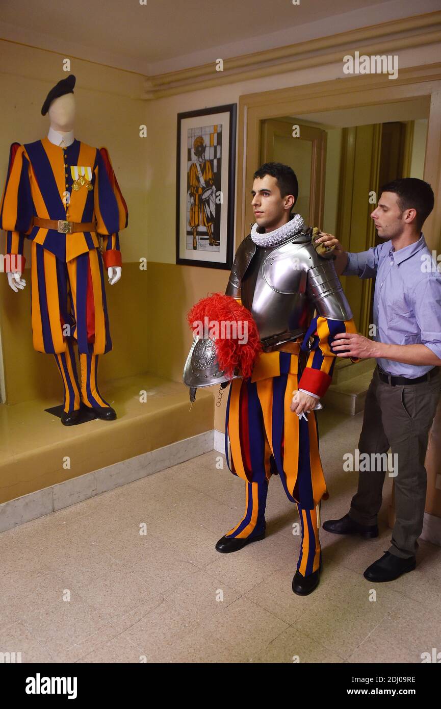 The Vatican's Swiss Guards swore in 23 new recruits on May 6, 2016 at the Vatican. The new recruits joined their ranks in an elaborate swearing-in ceremony . The ceremony is held each May 6 to commemorate the 147 Swiss Guards who died protecting Pope Clement VII during the 1527 Sack of Rome. Then each new recruit grasped the corps' flag and, raising three fingers in a symbol of the Holy Trinity, swore to uphold the Swiss Guard oath to protect pope Francis and his successors. The Swiss Guard, founded in 1506, consists of 100 volunteers who must be Swiss nationals, Catholic, single, at least 174 Stock Photo