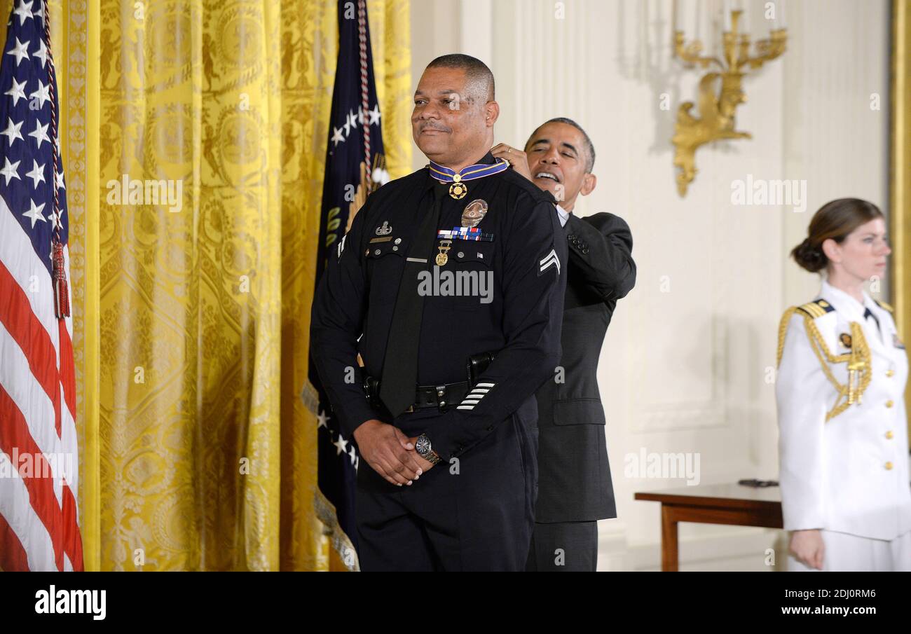 U.S. President Barack Obama awards Los Angeles Police Department Officer Donald Thompson with the 2013-2014 Public Safety Office Medal of Valor during a ceremony in the East Room of the White House May 16, 2016 in Washington, DC..Photo by Olivier Douliery/Abaca Stock Photo