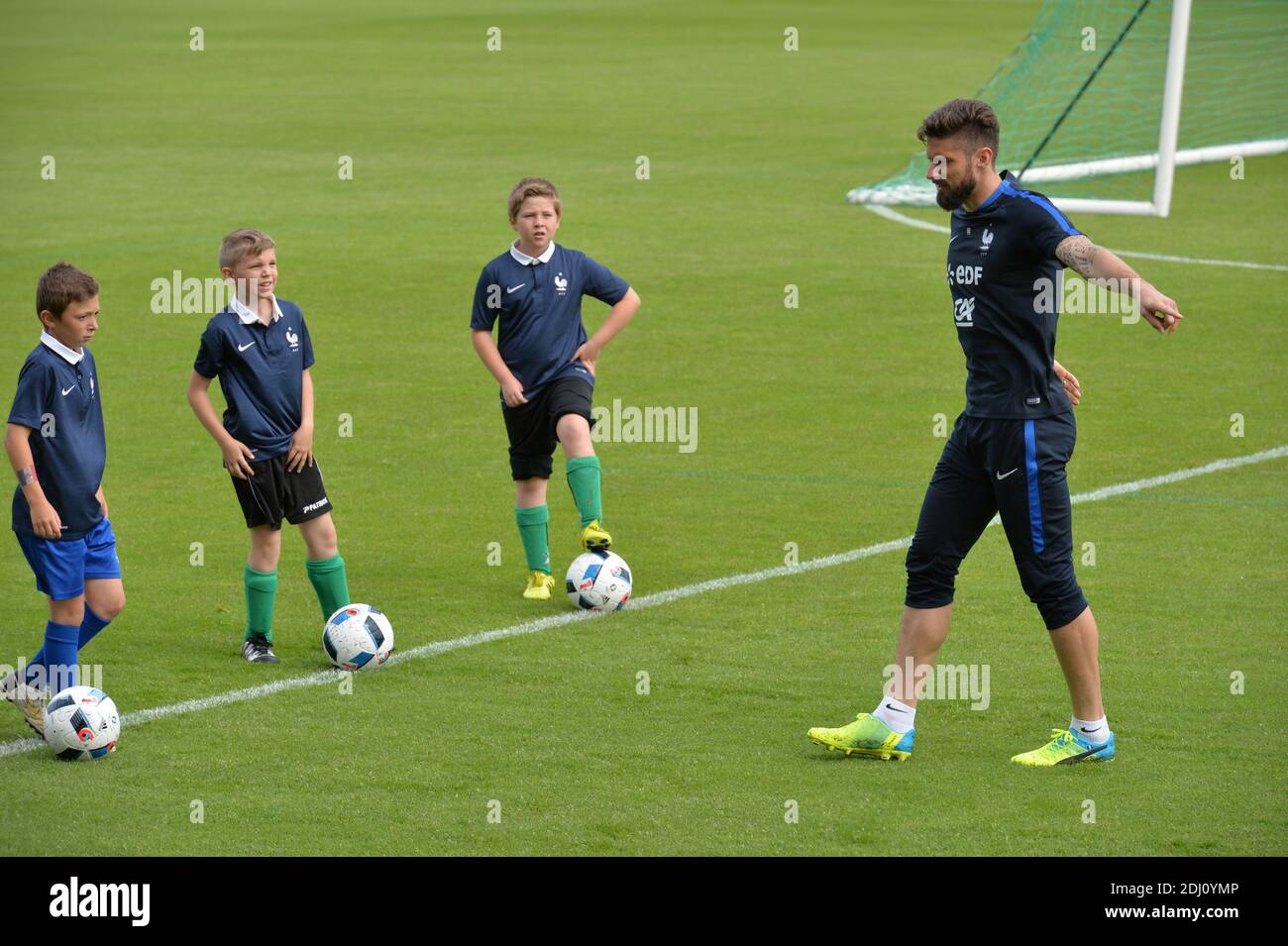 Olivier Giroud playing with children at the Aguilera stadium in Biarritz, France on May 18, 2016, as part of the team's preparation for the upcoming Euro 2016 European football championships. Photo by Pascal Rondeau/ABACAPRESS.COM Stock Photo