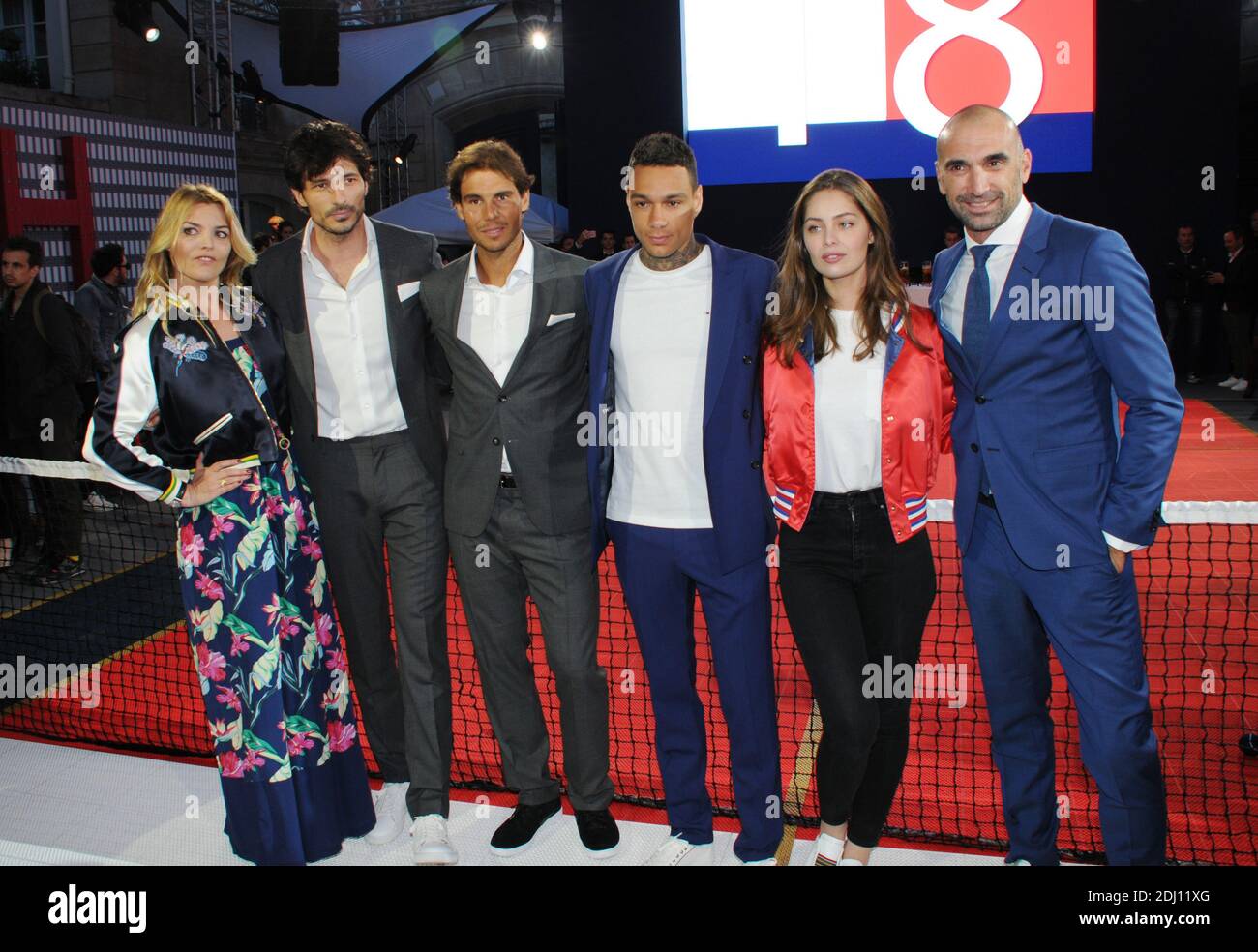 Actress Justine Fraioli Model Andres Velencoso Segura Tennis Player Rafael Nadal Football Player Gregory Van Der Wiel Model Marie Ange Casta And Football Player Jerome Alonzo During Tommy Hilfiger Hosts Tommy X Nadal