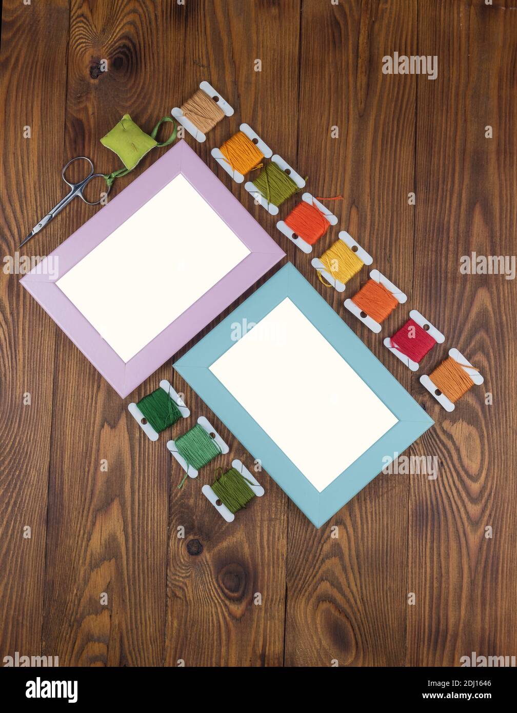 Download Wooden Frames For Cross Stitch Embroidery For Designer Mockup On Wooden Background Stock Photo Alamy