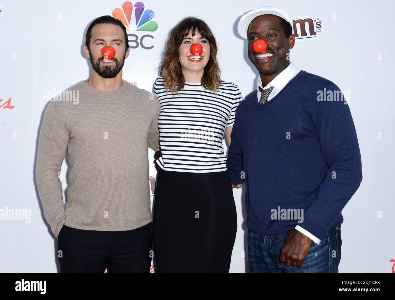 Milo Ventimiglia, Mandy Moore and Sterling K. Brown attend The Red Nose(01)
