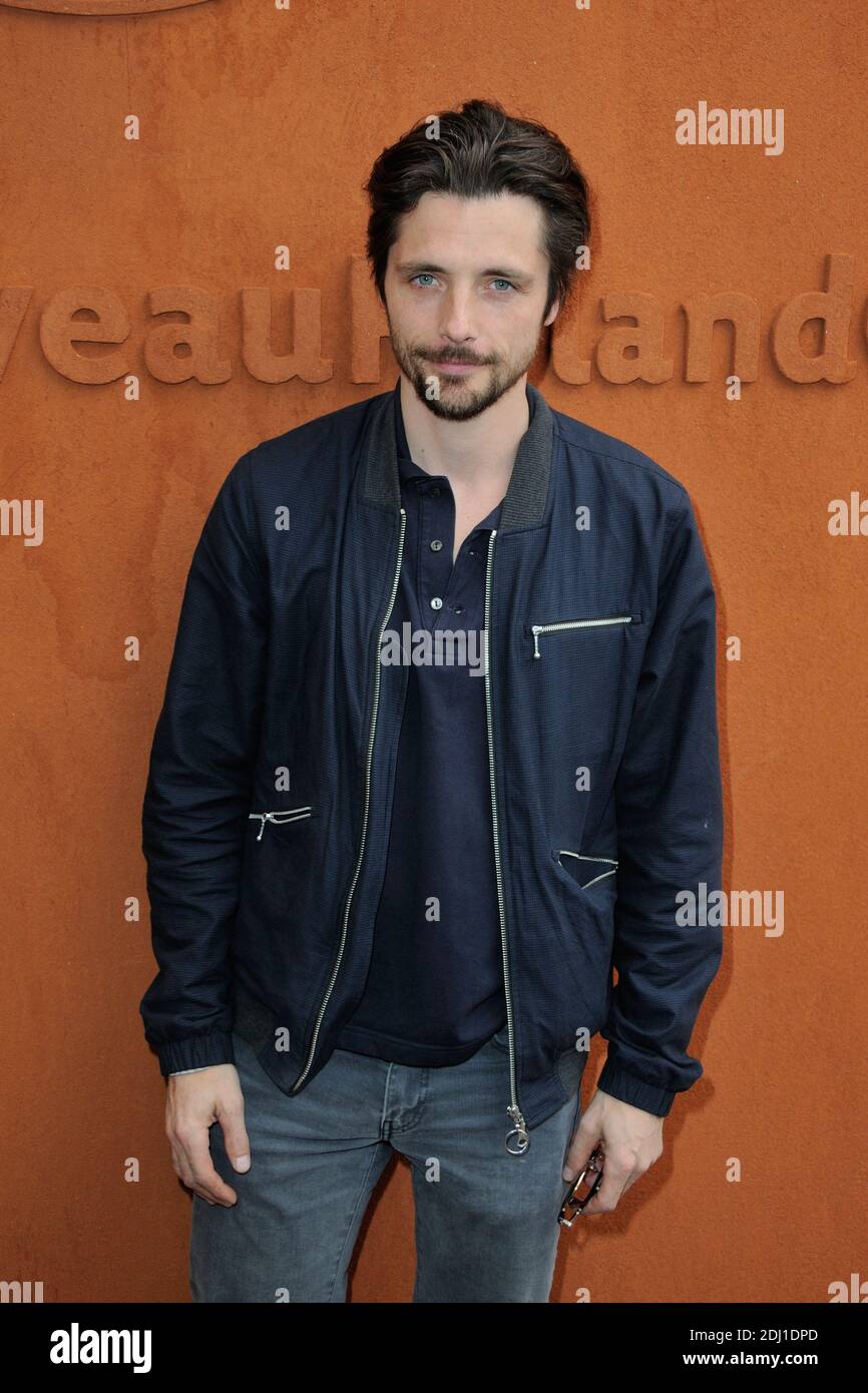 Raphael Personnaz posing at the Village during French Tennis Open at