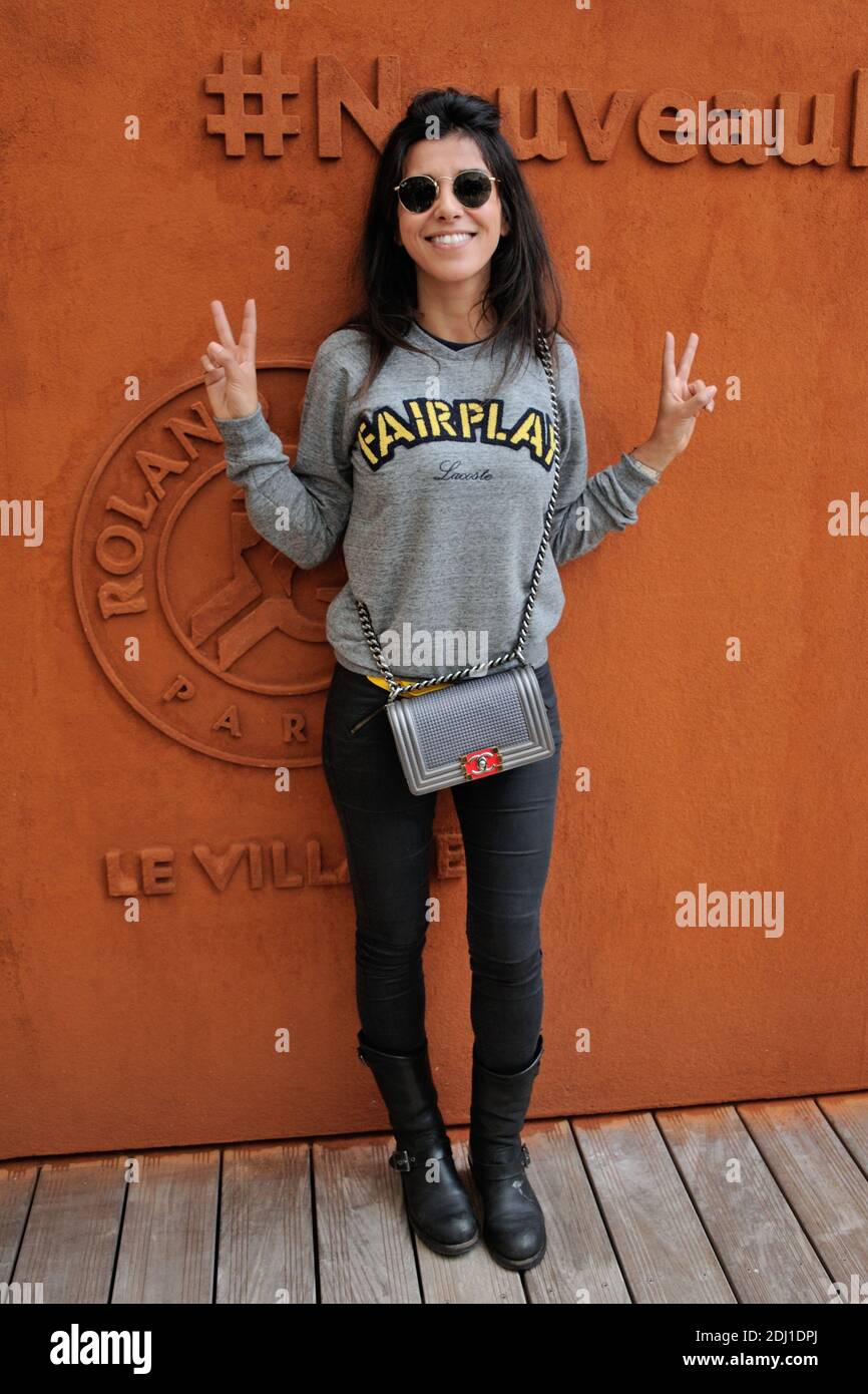 Reem Kherici Reem Kherici posing at the Village during French Tennis