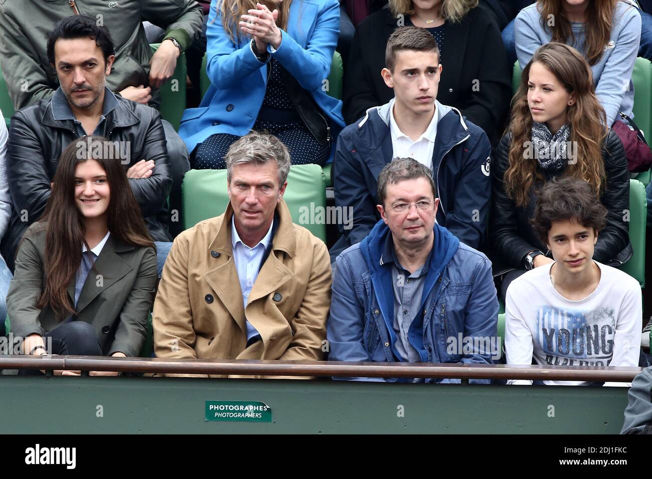 Philippe Caroit and his daughter with Frederic Bouraly in the VIP Tribune during French Tennis Open at Roland-Garros arena in Paris, France on May 29, 2016. Photo by ABACAPRESS.COM Stock Photo