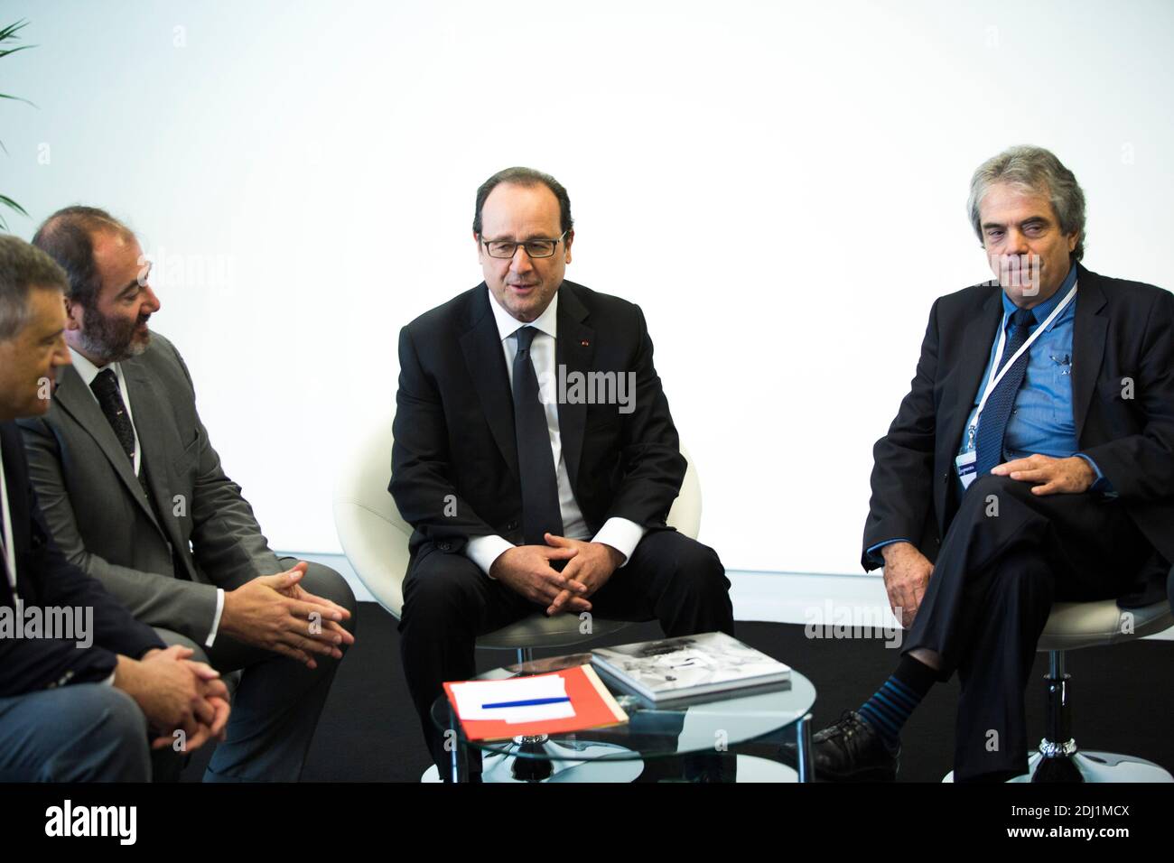 French President Francois Hollande during a round table meeting with  emergency physicists Prof. Pierre Carli, Dr. Francois Braun, Prof.  Pierre-Yves Gueugniaud, Prof. Bruno Riou and Dr. Patrick Pelloux during the  10th Emergency