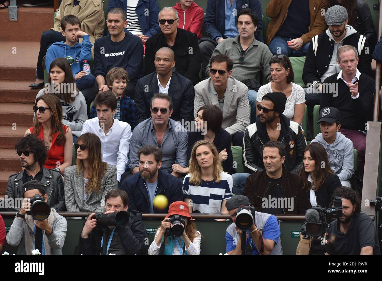 Actor Guillaume Gallienne, actor Yvan Attal, chef Cyril Lignac, actor Clive Owen, journalist Julien Arnaud, Elsa Zylberstein, actor Jean Dujardin, Nathalie Pechalat, singer Maxime Nucci, model Caroline de Maigret and her companion musician Yarol Poupaud, actors Clovis Cornillac and his wife Lilou Fogli, TV Host Arthur Essebag and Mareva Galanter attend Day Fifteen, Men single's Final of the 2016 French Tennis Open at Roland Garros on June 5, 2016 in Paris, France. Photo by Laurent Zabulon/ABACAPRESS.COM Stock Photo