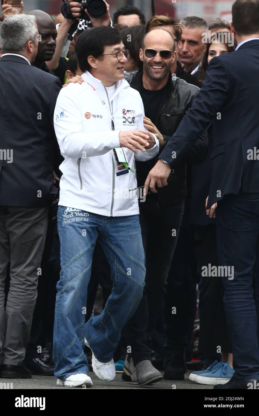 Brad Pitt, Jason Statham and Jackie Chan at the start of the 84th Le
