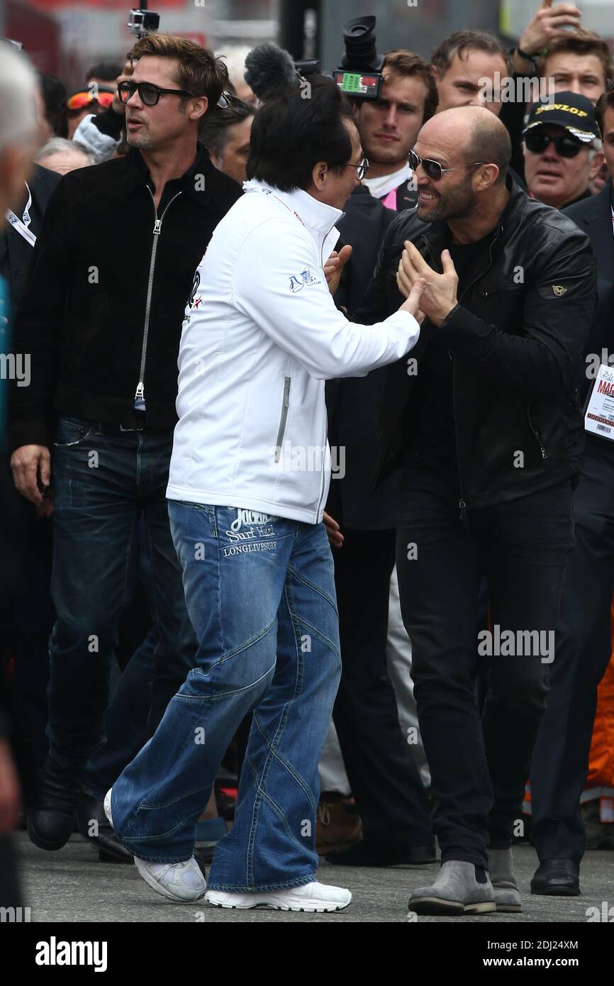 Brad Pitt, Jason Statham and Jackie Chan at the start of the 84th Le