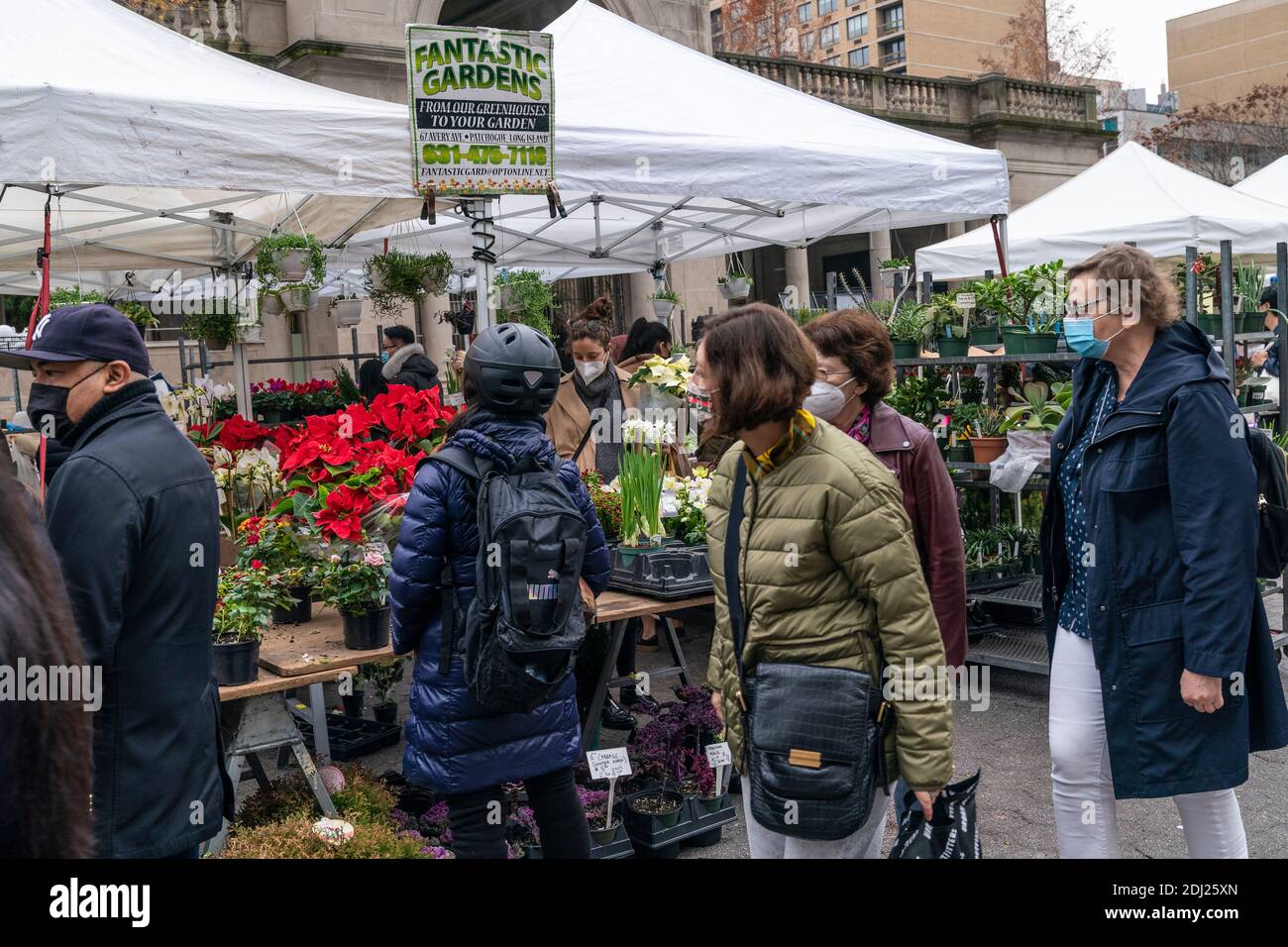 New York, NY - December 12, 2020: People shopping during Holiday season at Union Square farmers market Stock Photo