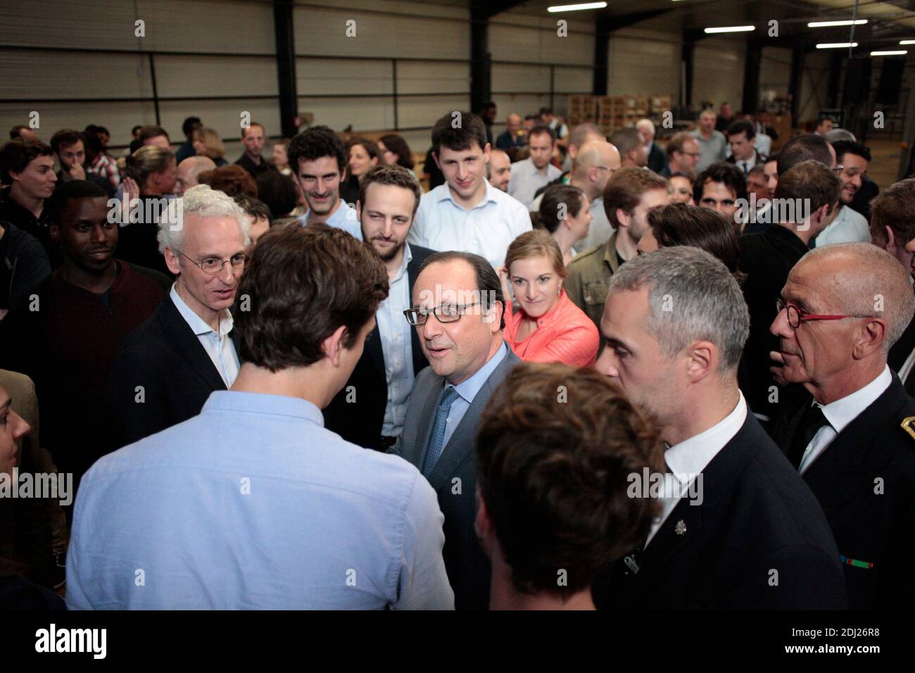 French President Francois Hollande meets with emplyees and poses for selfies as he tours the workshop during a visit to start-up Devialet, an international leader for high-end amplifiers, in Chatelet-en-Brie, near Paris, France on June 21, 2016. Photo by Eliot Blondet/ABACAPRESS.COM Stock Photo