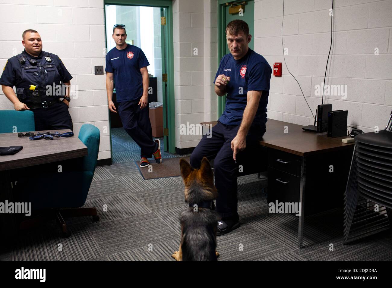 July 21, 2019: Former MMA heavyweight champ Stipe Miocic has been a part time Valley View, Ohio firefighter since 2010. (R) Stipe talks with Valley View Police officer (L) Ricky Crumbley and fellow fighter (C) Brett Dugas. Photo by Michael F McElroy Credit: Michael McElroy/ZUMA Wire/Alamy Live News Stock Photo