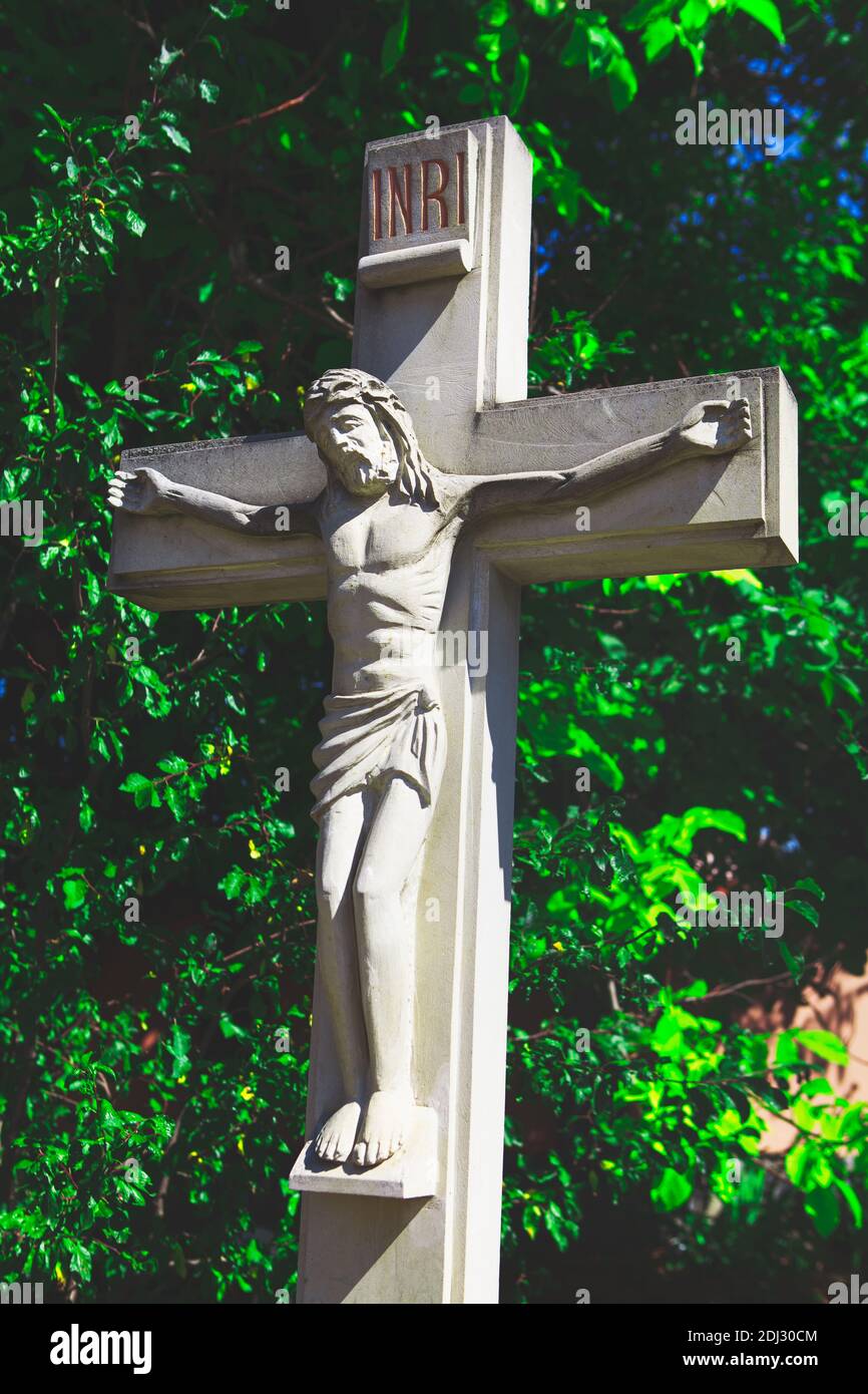 Sculpture of Jesus Christ with Cross . Christianity symbol Stock Photo ...