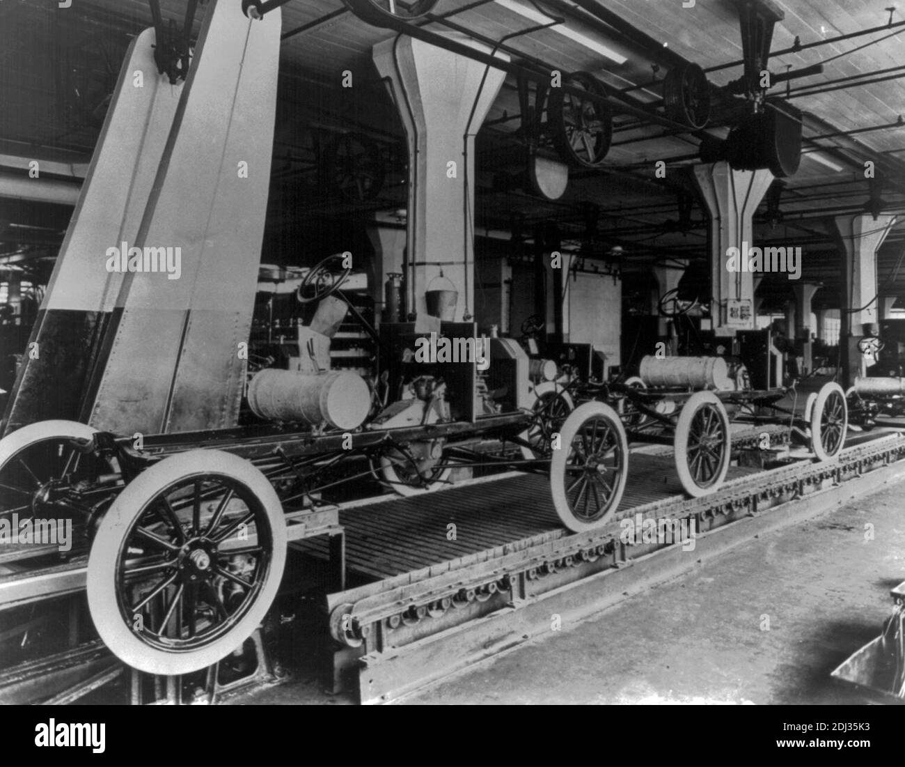 Assembly line at the Ford Motor Company's Highland Park plant, circa 1913 Stock Photo