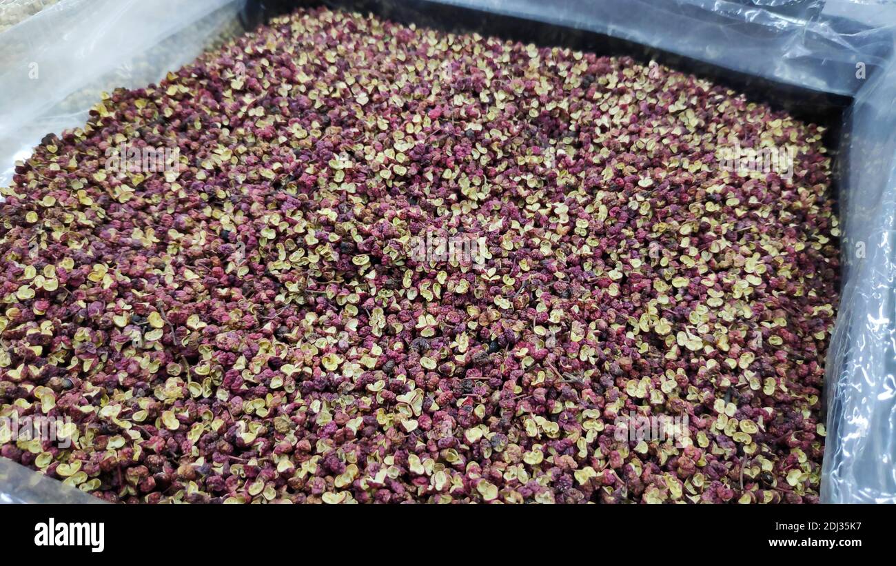 Dried Sichuan pepper display on market for sell Stock Photo