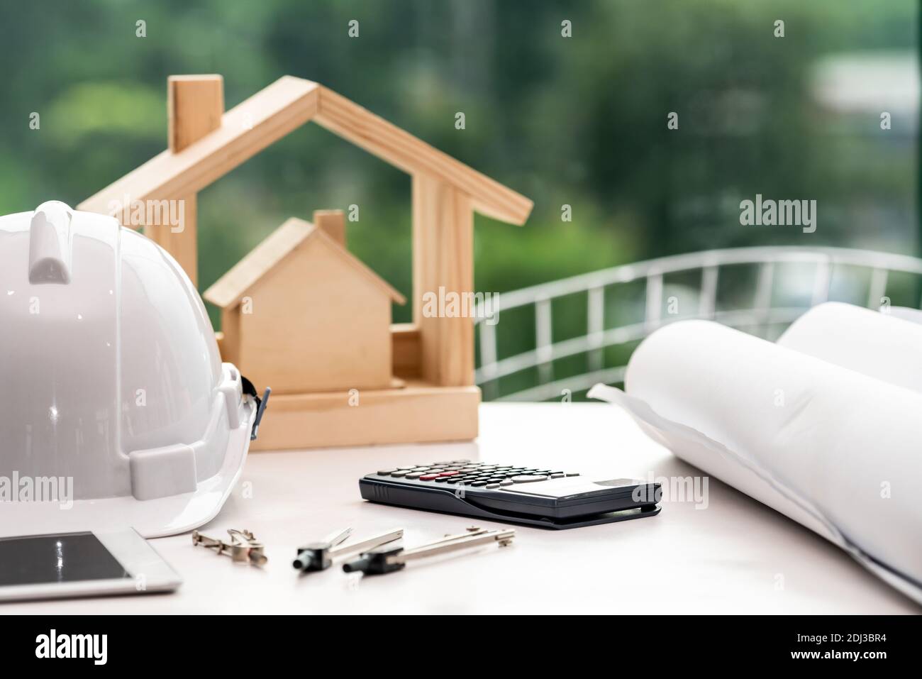 Workspace of architect and engineer. Build construction measurement objects laying on desk in workplace. Engineering concept. Stock Photo