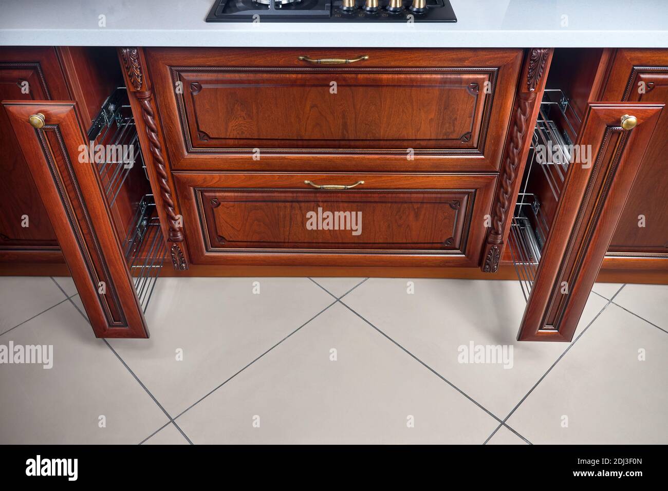 Pull out spice rack filler pantry. Two vertical drawers for