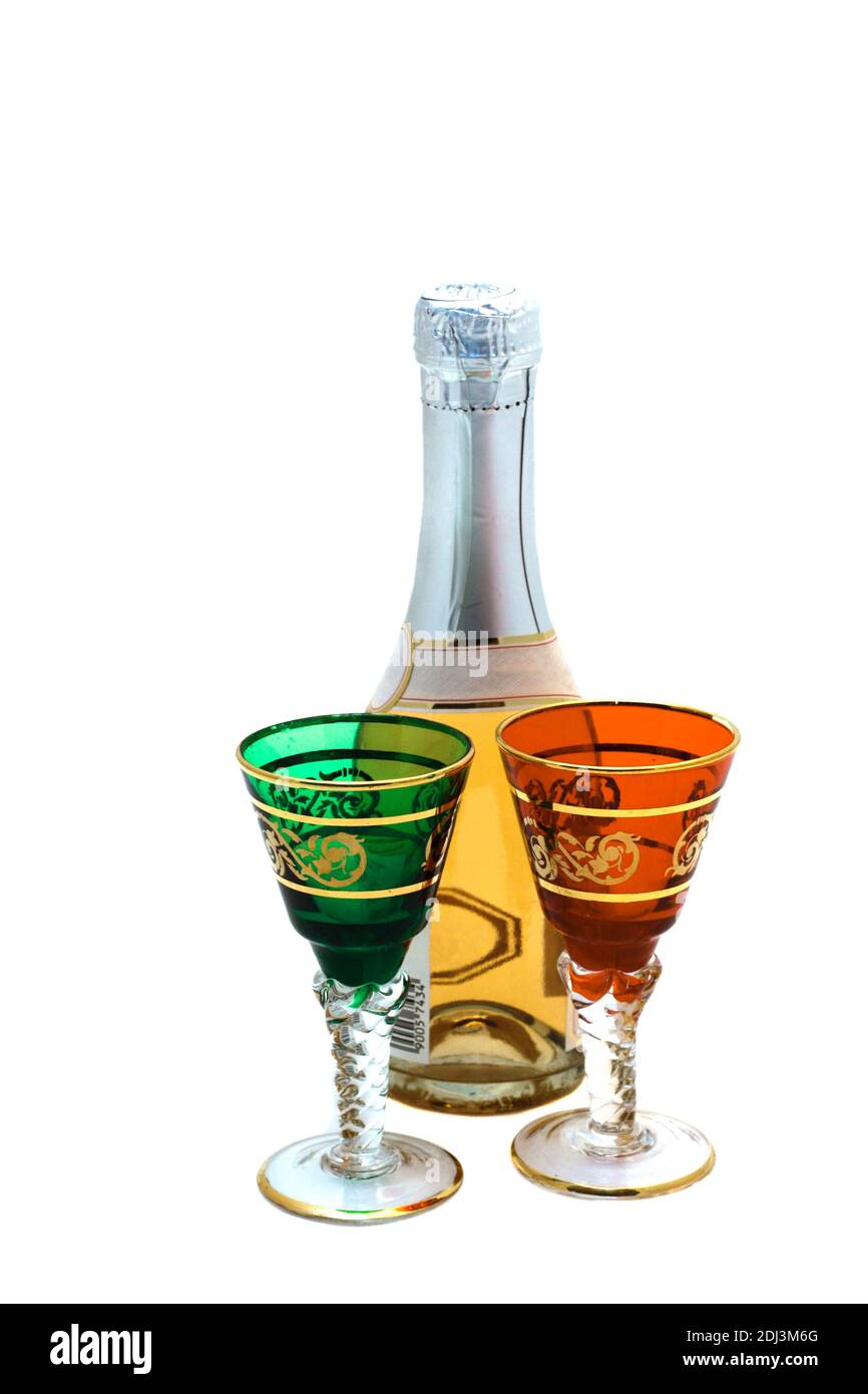 https://c8.alamy.com/comp/2DJ3M6G/a-bottle-of-wine-and-two-colored-glasses-on-white-background-2DJ3M6G.jpg