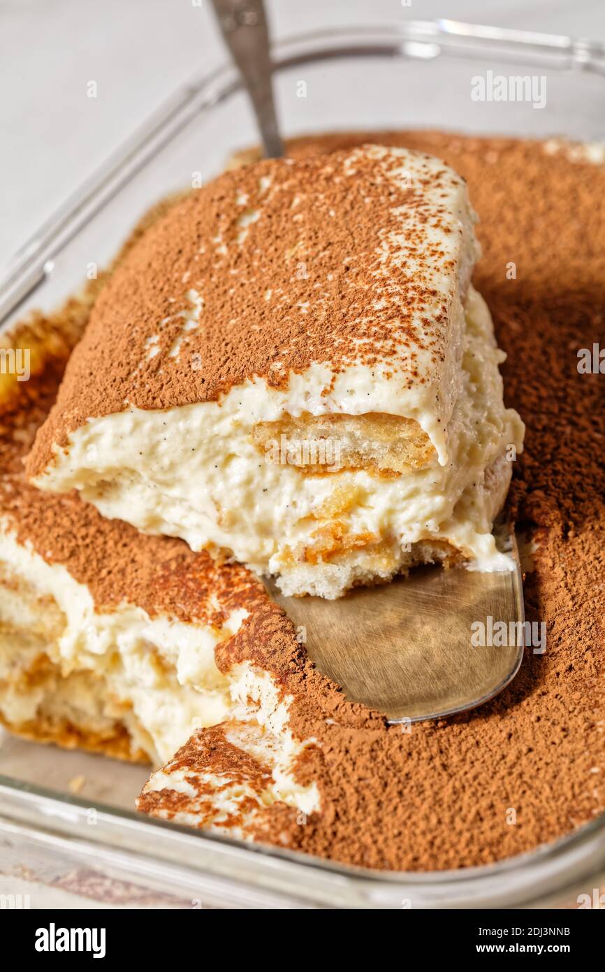 Italian dessert tiramisu of ladyfingers or savoiardi soaked in espresso