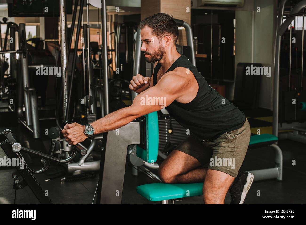 Man working out in gym, fitness time Stock Photo