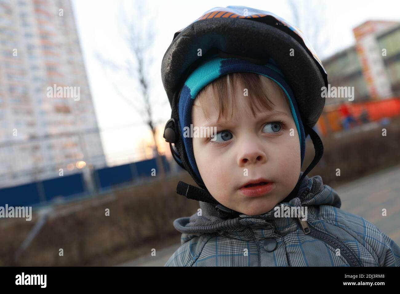 Portrait of child with crash helmet in spring Stock Photo Alamy
