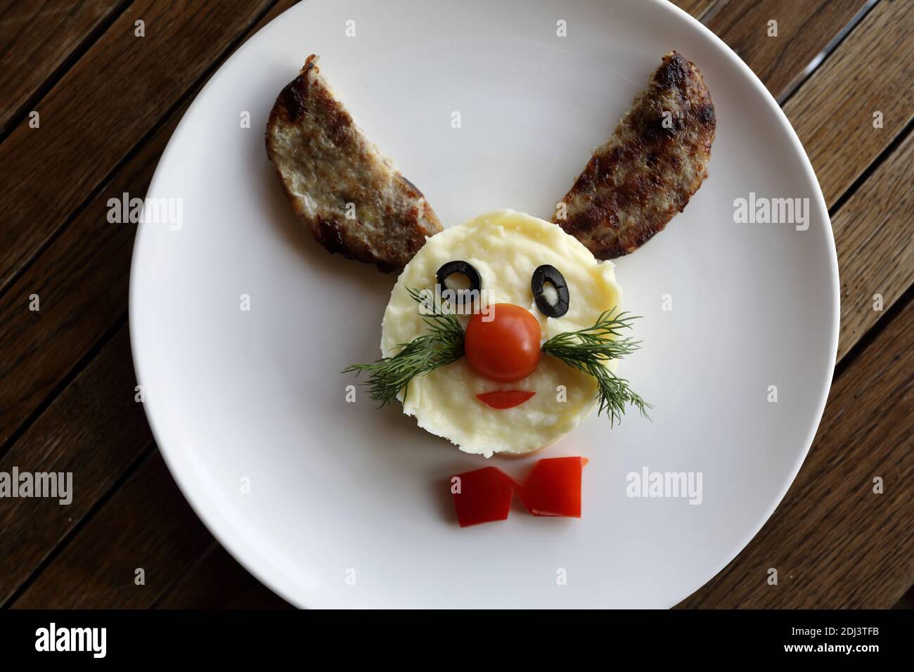 Cutlets with mashed potatoes in form of rabbit Stock Photo