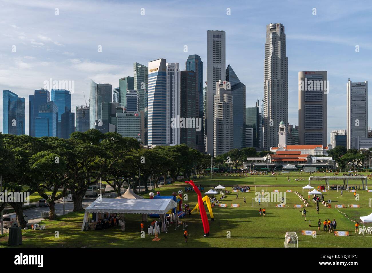 Singapore - December 10, 2016: Morning view over the lively Padang Square to the downtown core. This part forms the central business, the heart of the Stock Photo