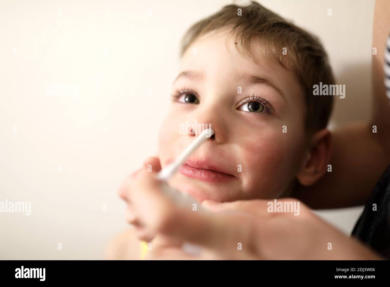 Treatment of a child cold at home Stock Photo