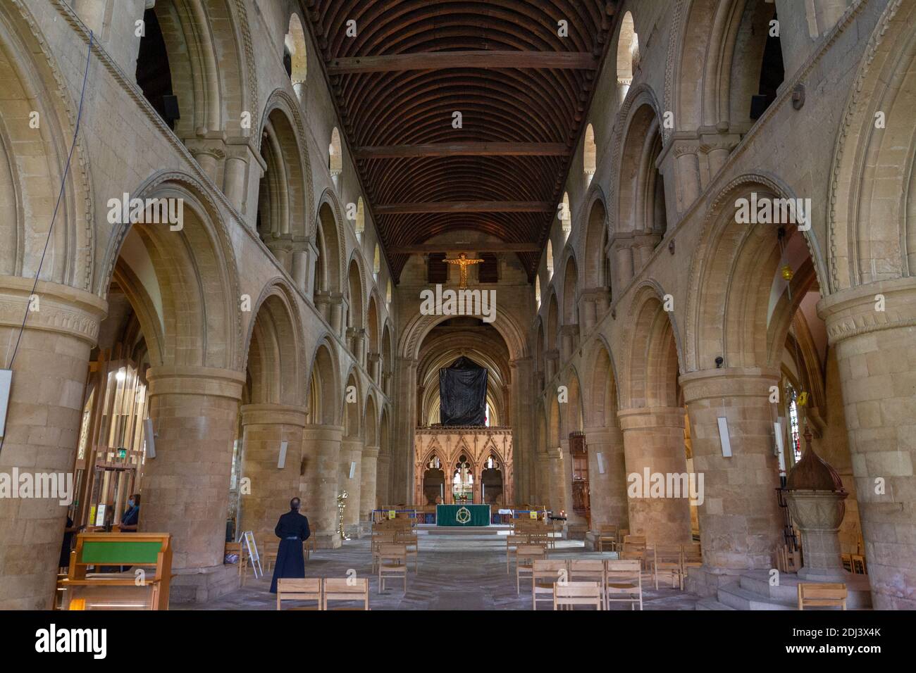 View down the nave inside Southwell Minster, with its wooden barrel vault (ceiling) designed by Ewan Christian, Southwell, Nottinghamshire, UK. Stock Photo