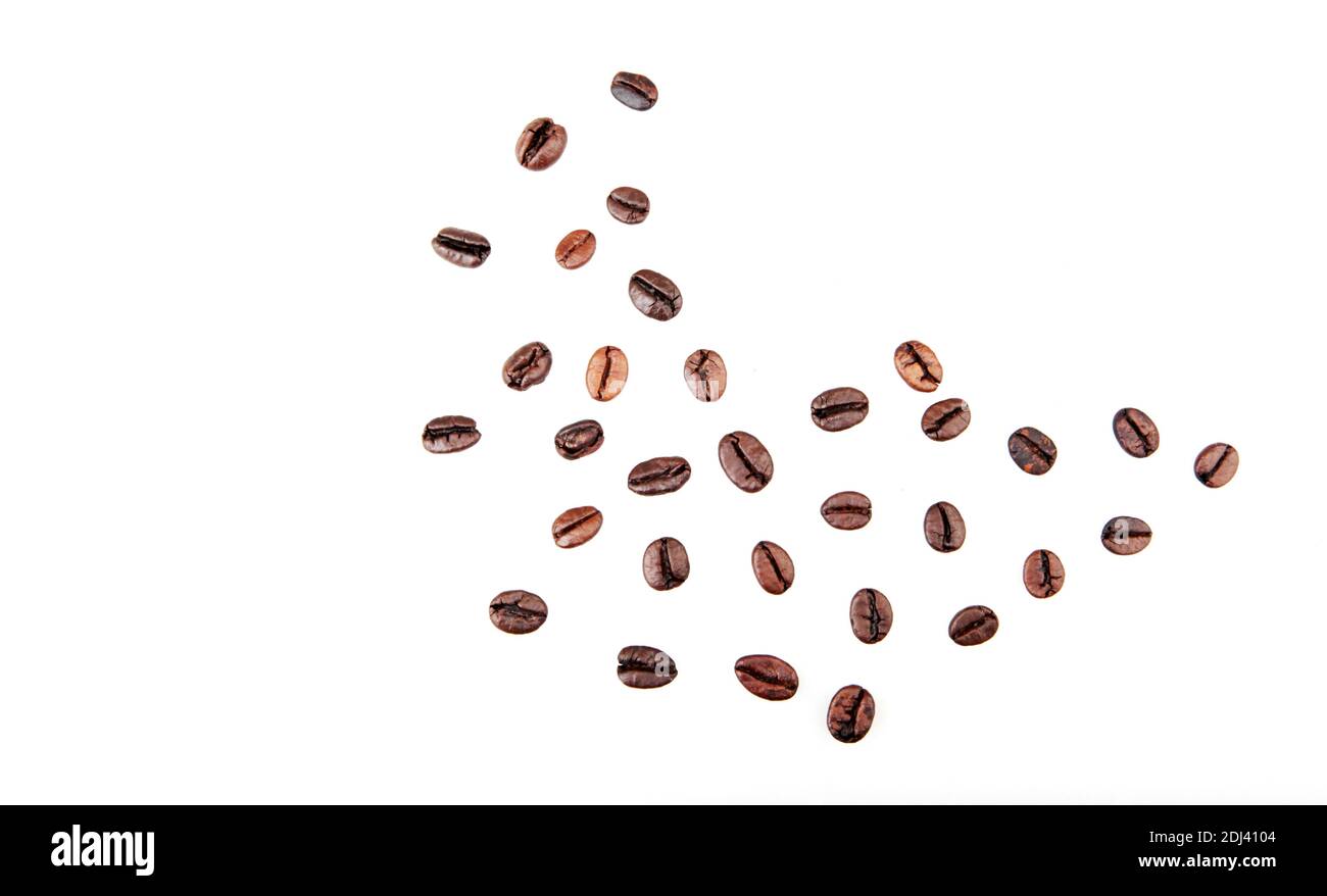 Roasted coffee beans isolated on a white background Stock Photo - Alamy