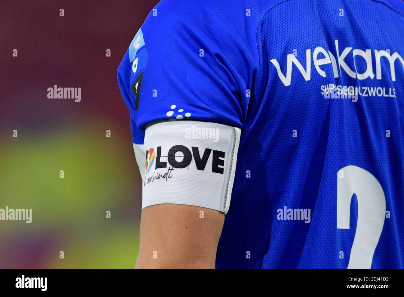 AMSTERDAM, NETHERLANDS - DECEMBER 12: OneLove rainbow colors captaincy during the Dutch Eredivisie match between Ajax and PEC Zwolle at Johan Cruijff Stock Photo
