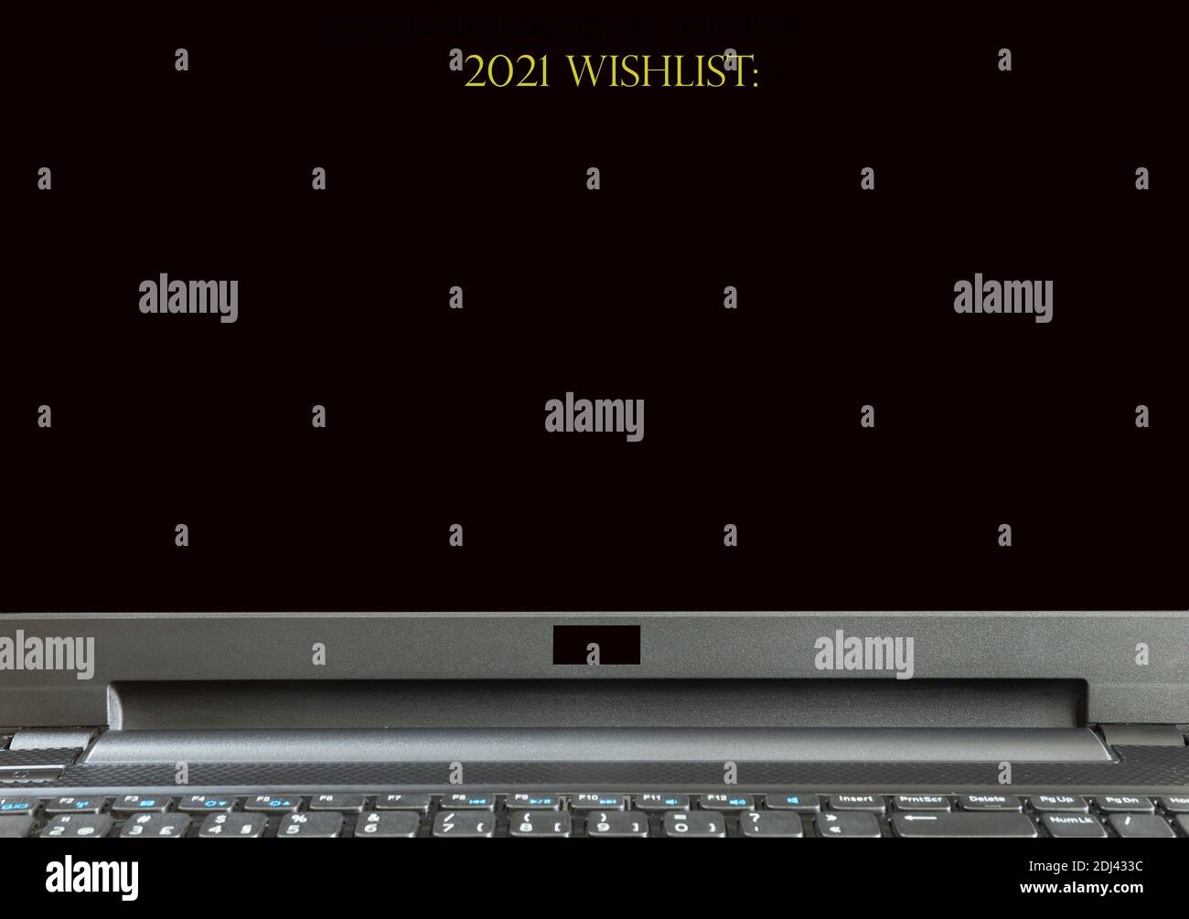 2021 wishlist. Laptop screen displaying 2021 wishlist in golden colored text. 2021 wish list. With copy space. Stock Photo
