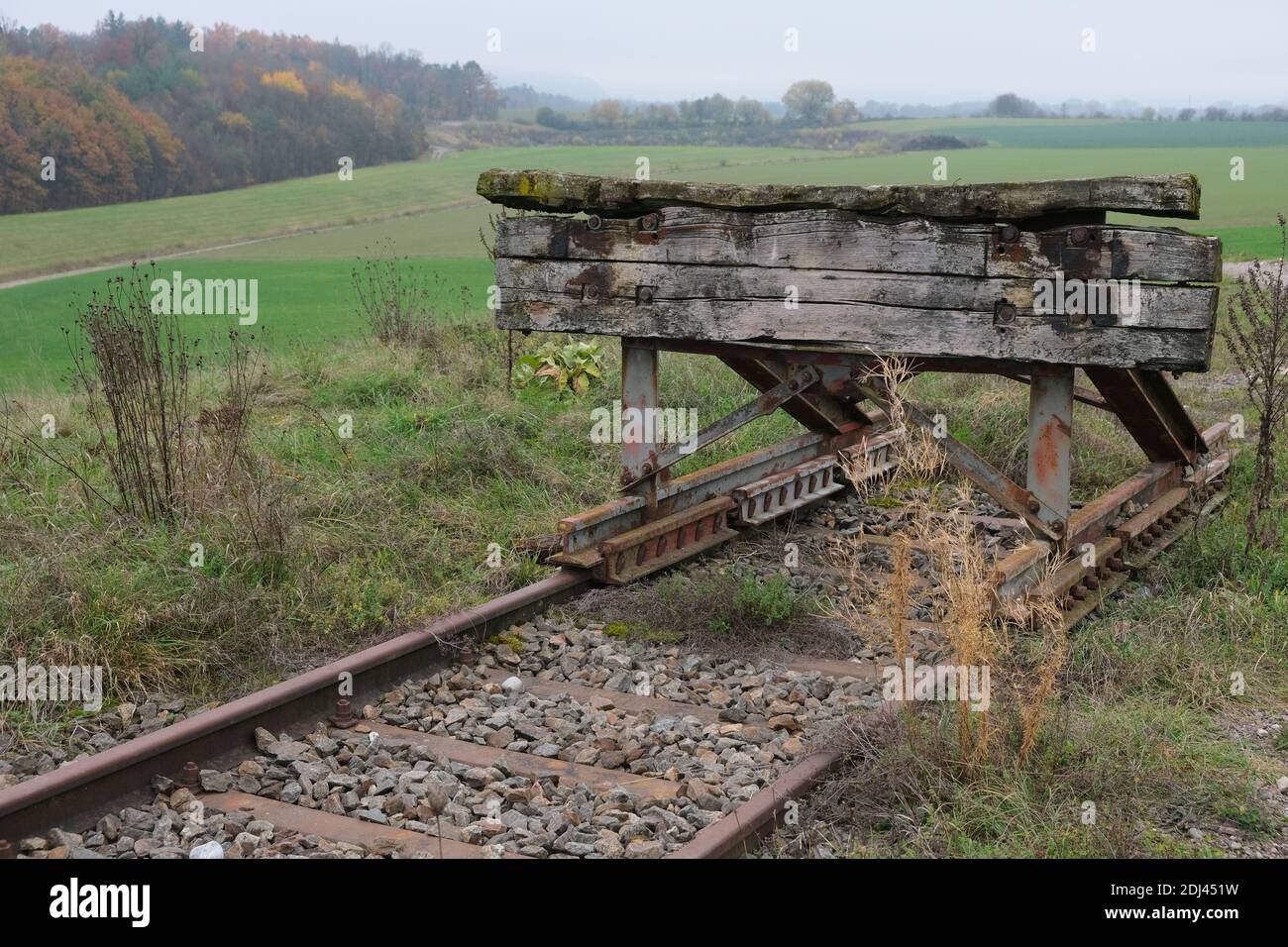 An old wooden buffer stop in Switzerland Stock Photo