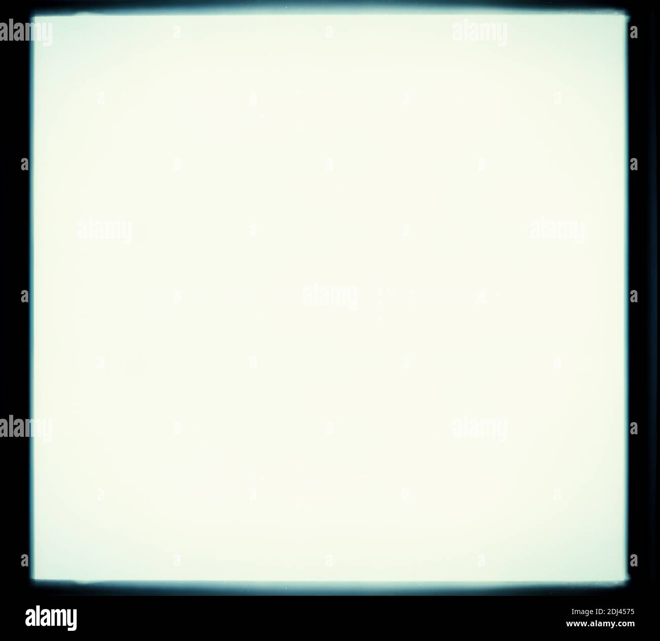 Overexposed square grainy medium format film frame. Film texture