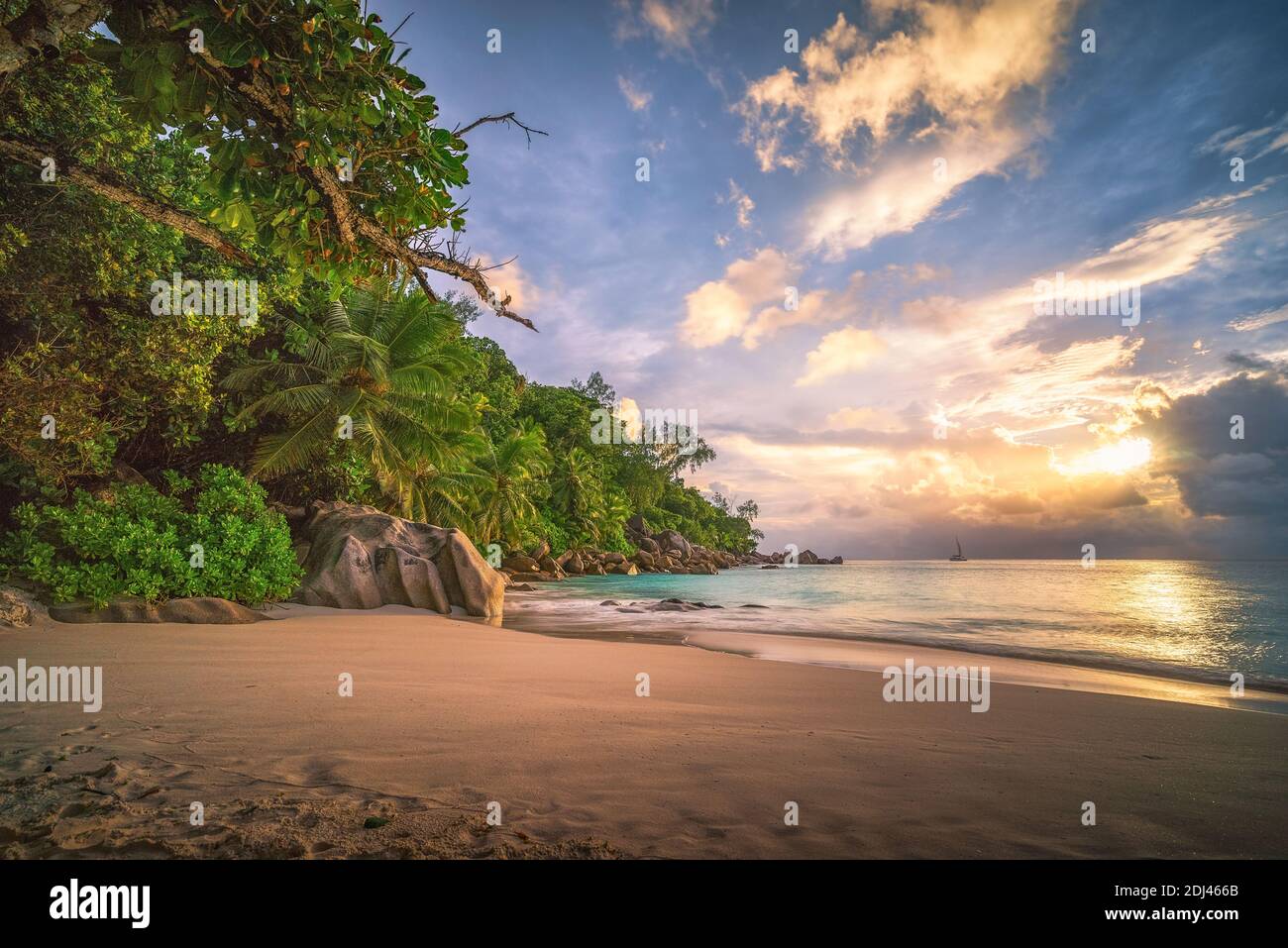 beautiful sunset on tropical beach at anse georgette on praslin, seychelles Stock Photo