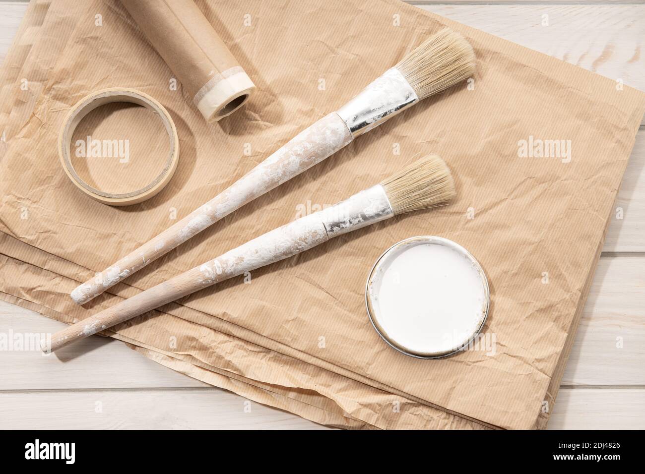 Set of painting tools brushes, masking tape, paper. DIY Home Improvement Paint. Top view Stock Photo
