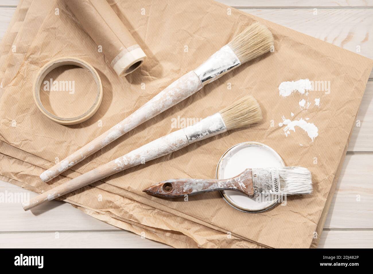 Set of painting tools brushes, masking tape, paper. DIY Home Improvement Paint. Top view Stock Photo