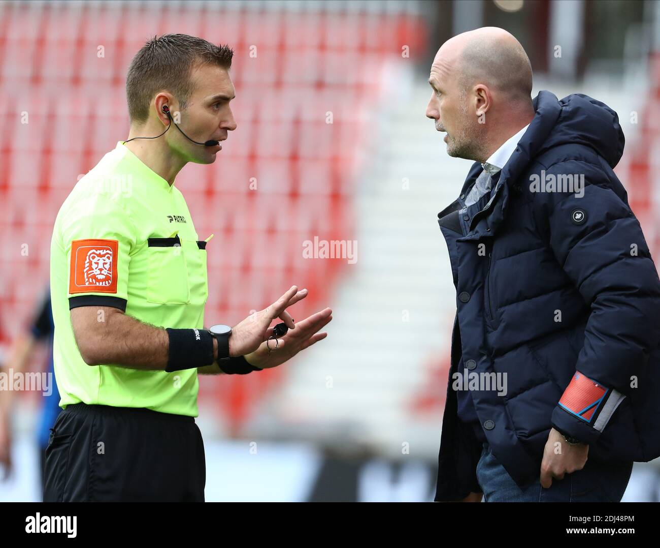 Club Brugge's head coach Philippe Clement is discussing with referee Nicolas Laforge during a soccer match between Royal Antwerp FC and Club Brugge, S Stock Photo