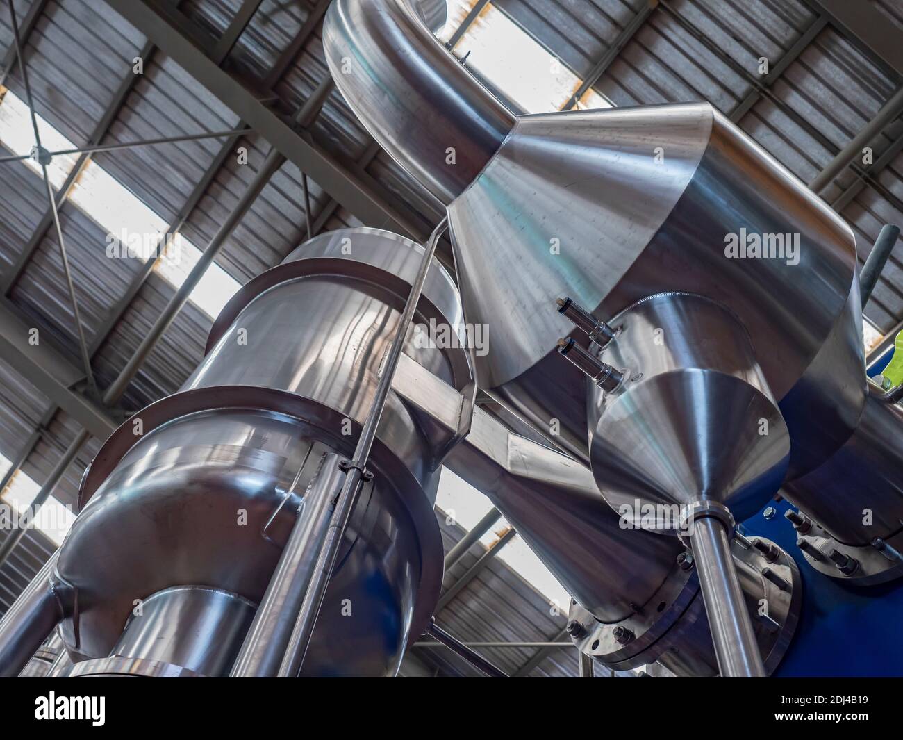 Stainless steel abstract, piping, tanks and ducting for plate heat exchanger. Stock Photo