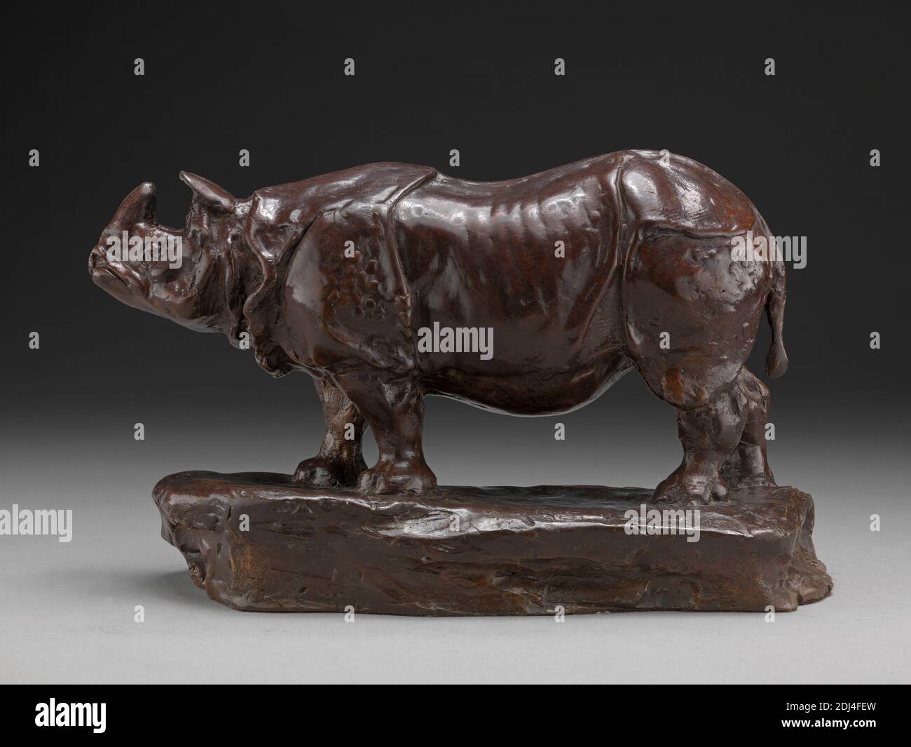 Indian Rhinoceros, John R. Skeaping, 1901–1980, British, Cast 1990 (original model 1915), Bronze, Overall: 4 1/2 x 10 inches (11.4 x 25.4 cm), animal art, Indian, rhinoceros Stock Photo