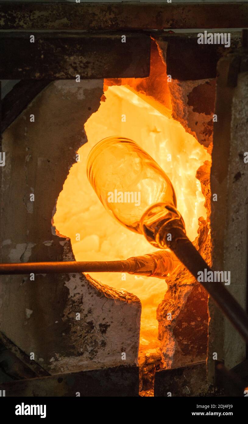 Glassmaker's the glass is in the oven to melt before forming