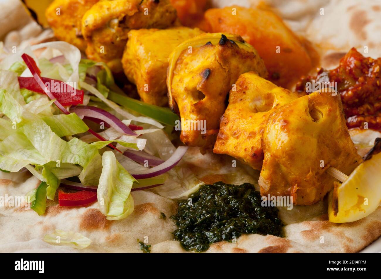 Indian Ethnical Food Tandoori chicken on Naan bread Stock Photo Alamy