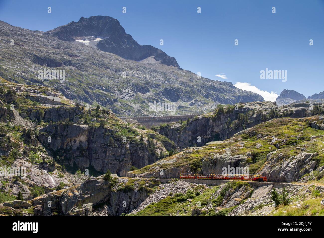 tourist train running through a mountain gorge in the Pyrenees, Artouste France Stock Photo