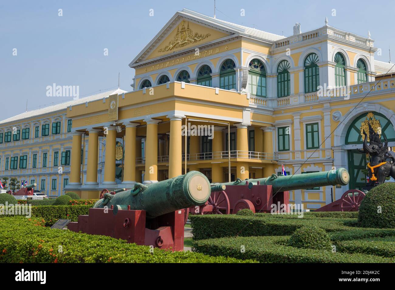 BANGKOK, THAILAND - DECEMBER 28, 2018: Antique cannons at the entrance to the main building of the Ministry of Defense Stock Photo